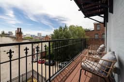 Lux 4BR Townhome | City Views | Private Balconies