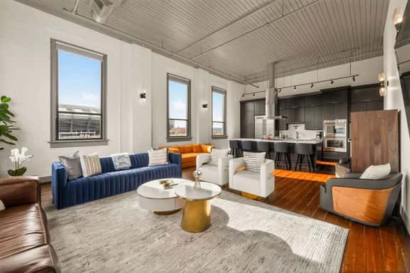 Luxury 6BR Retreat w Rooftop Deck at TQL Stadium - Image 1