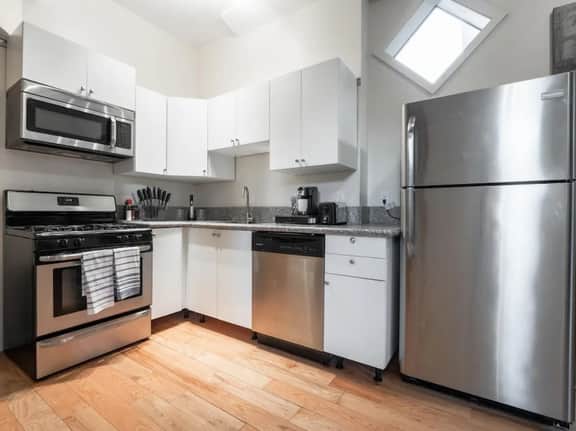 Cozy OTR Home with Private Roof Deck